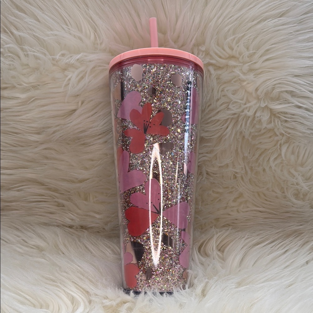 Floral Glitter Tumbler with Pink Lid

Never used